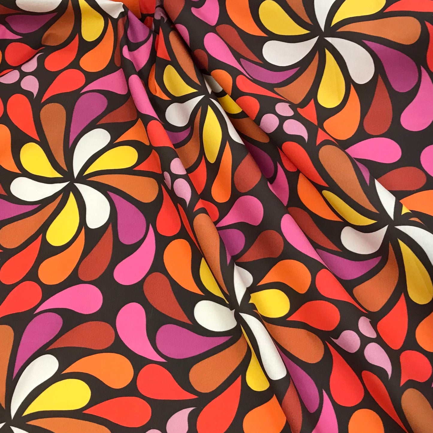 In a Spin - large, 1970s festival colours